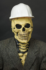 Image showing Terrible dude in mask of skeleton with helmet