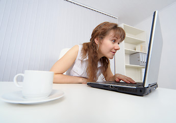 Image showing Young woman keen on watching pornographic sites on Internet