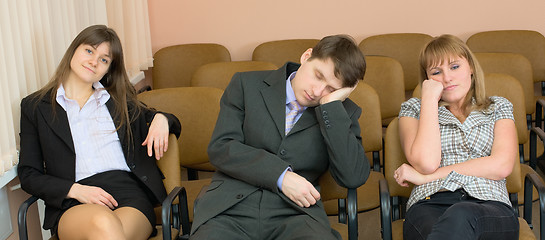 Image showing Businessman has fallen asleep sitting at conference