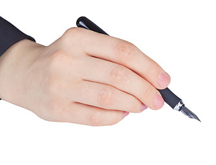 Image showing Hand holds an ancient pen