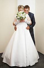 Image showing Groom hugging beautiful bride