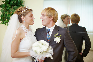 Image showing Bride and groom looking at each other