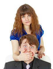 Image showing Woman closed mouth to man
