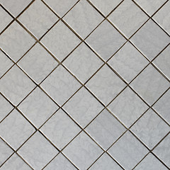 Image showing Wall covered with tile - diagonal square texture