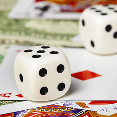 Image showing Dice against cards and money