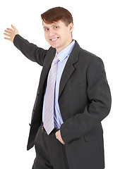 Image showing Hospitable businessman in a business suit on white background