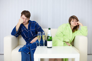 Image showing Couple sitting on couch after a quarrel