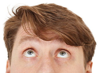 Image showing Eyes of man look upwards, close up