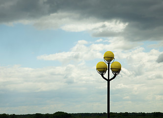 Image showing Ancient lamppost against evening sky