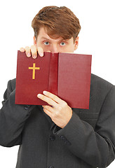Image showing Priest defends the Scriptures