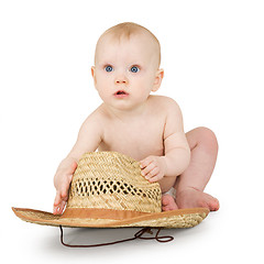 Image showing Infant with straw cowboy hat