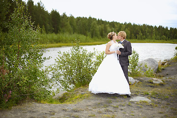 Image showing Bride and groom on nature