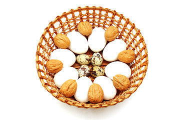 Image showing Eggs and quail egg in the basket