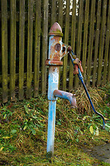 Image showing Countryside old water pump