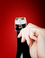 Image showing Opening champagne bottle