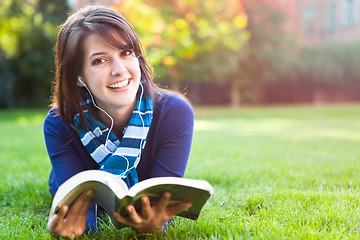 Image showing Mixed race college student studying