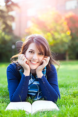 Image showing Mixed race college student studying