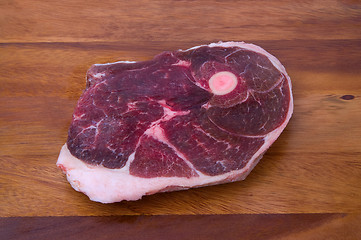Image showing Raw meat on the wooden board