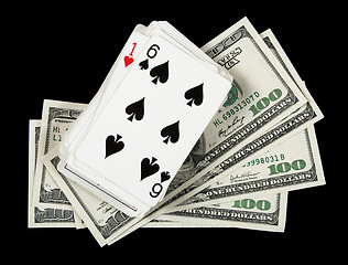 Image showing Deck of cards and money on black background