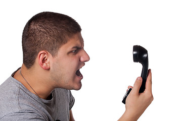 Image showing Man Screaming Into the Telephone