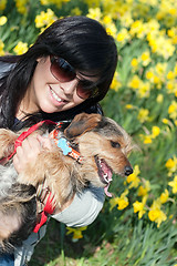 Image showing Woman and Her Dog in the Spring Time