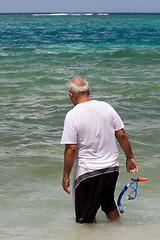 Image showing Senior Citizen Snorkeling in Tropical Waters