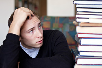 Image showing Stressed Student Looks At Books