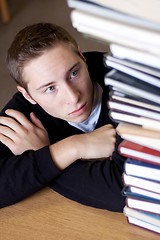 Image showing Stressed Student Looks At Books