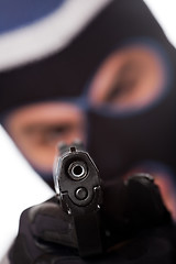 Image showing Ski Masked Criminal Pointing a Gun