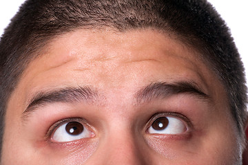 Image showing Man Looking Upward at His Forehead
