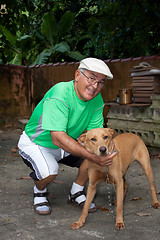 Image showing Senior Citizen Man and His Dog