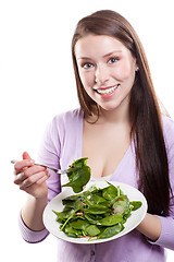 Image showing Woman eating salad