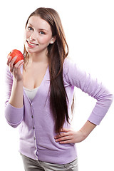 Image showing Woman holding an apple