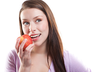 Image showing Woman eating apple