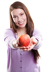 Image showing Woman holding an apple