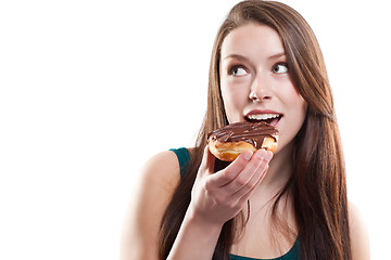 Image showing Woman eating donut