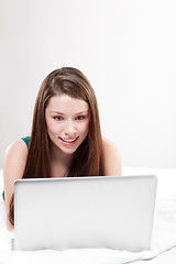 Image showing Young woman with laptop