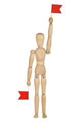 Image showing wooden toy man with red flags