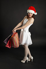 Image showing Happy girl with Christmas gifts
