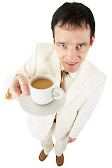 Image showing Man offers a cup of coffee