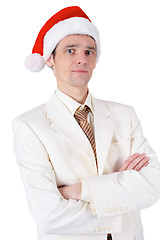 Image showing Businessman in red Christmas hat on white background