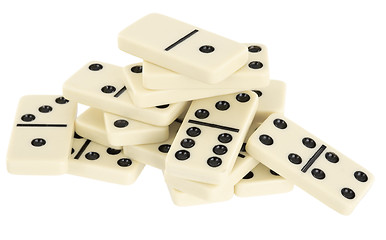 Image showing Pile of dominoes isolated on white background
