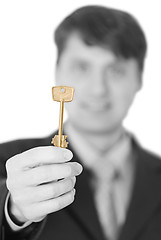 Image showing Business people gives us a golden key