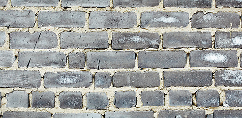 Image showing Old moldy gray brick wall