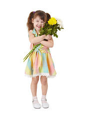 Image showing Happy little girl with bouquet of flowers