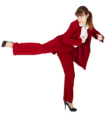 Image showing Woman in business suit kicks back