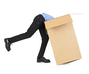 Image showing Man looking for his things in box