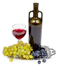 Image showing Bottle of red wine, glass and grapes - still life