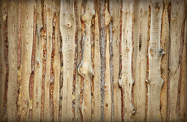 Image showing Wooden fence made of boards and slabs - background