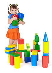 Image showing Happy smiling children playing with colorful toys